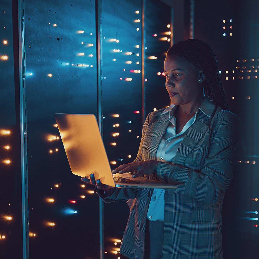 Professional woman with server hardware