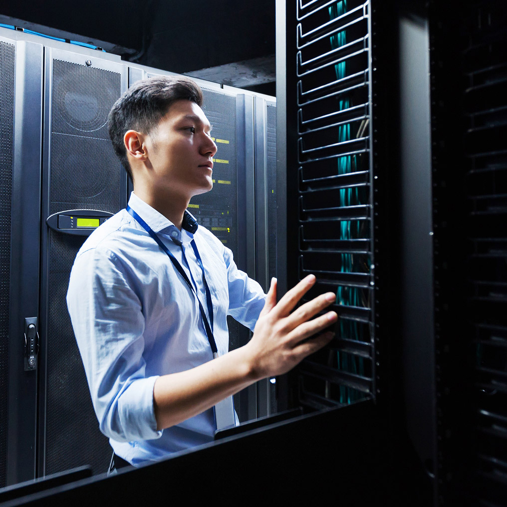 Professional man inspecting server hardware